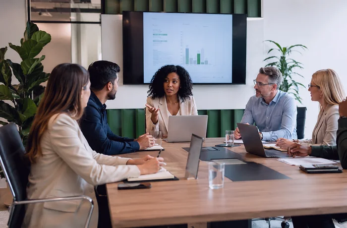 Business team in boardroom discussion