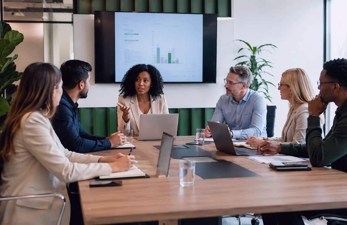 Professional people reviewing event space requirements